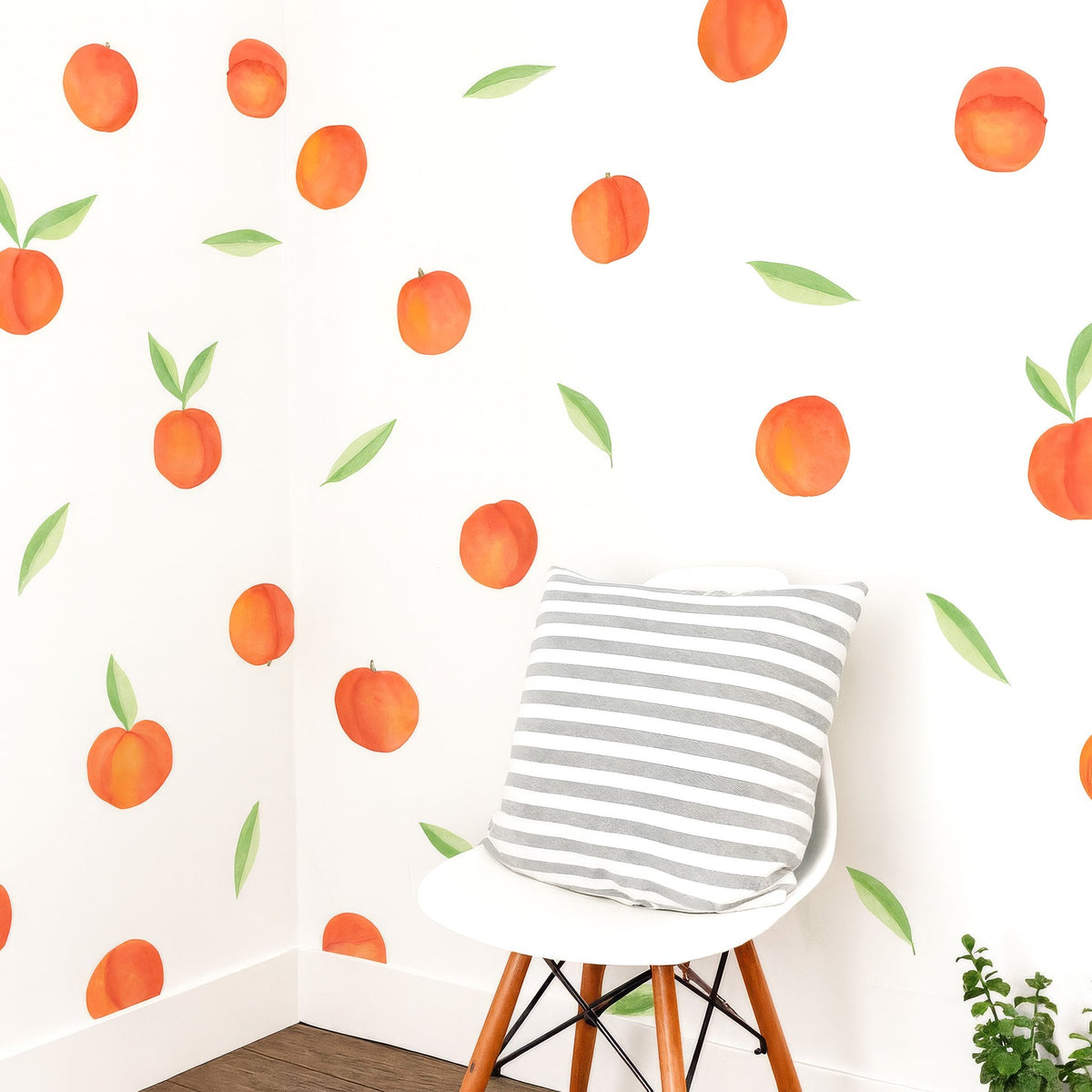 Peach wall decal arranged on a feature wall