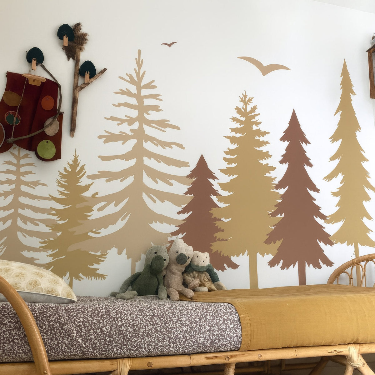 Pine forest wall decal styled in a playroom with rocking horse