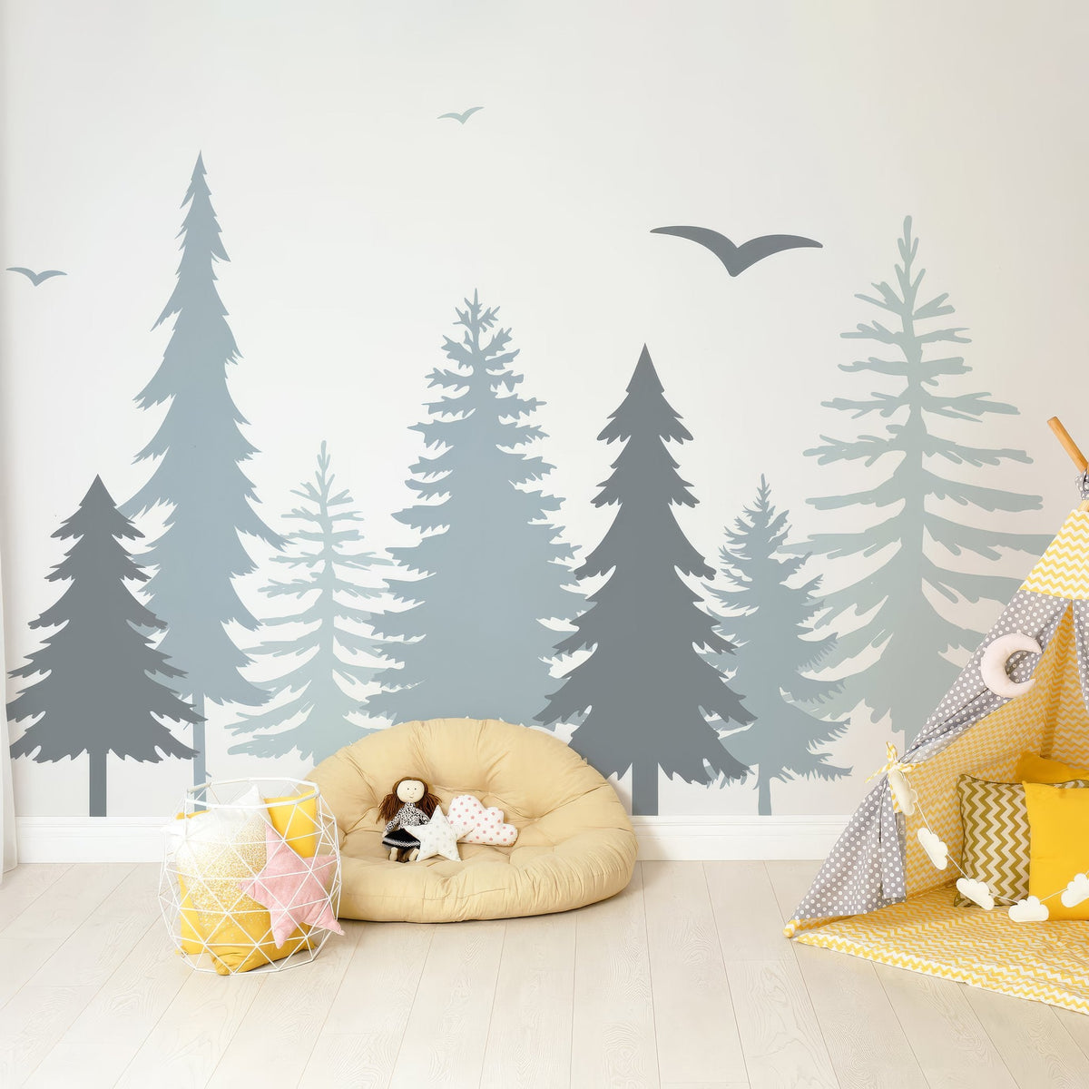 Pine forest wall decals displayed in a styled child's room