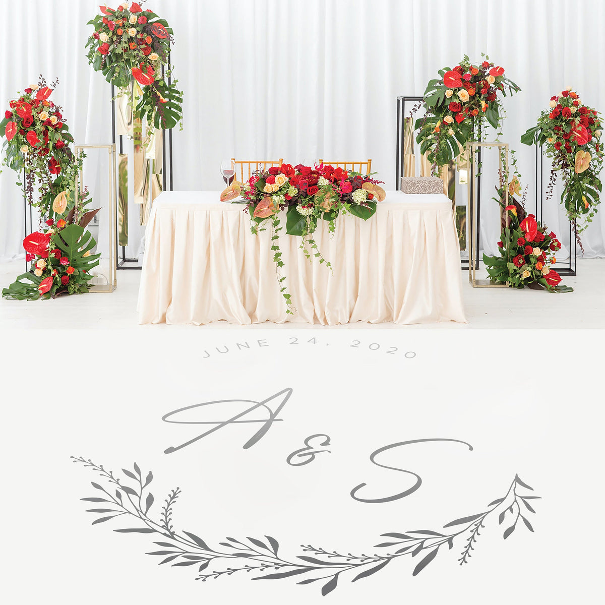 Botanical Crest Monogram Dance Floor Decal for Wedding shown at a wedding reception