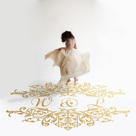 Victorian Scroll Monogram Dance Floor Decal for Wedding in gold on a white wedding dance floor