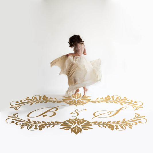 Damask Garland Initials Dance Floor Decal for Wedding in gold on a white wedding dance floor