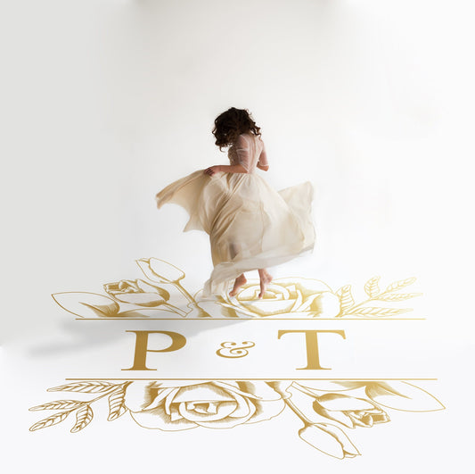 Etched Rose Garden Dance Floor Decal for Wedding in gold on a white wedding dance floor