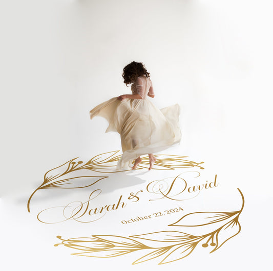 Copperplate Script Dance Floor Decal for Wedding in gold on a white wedding dance floor