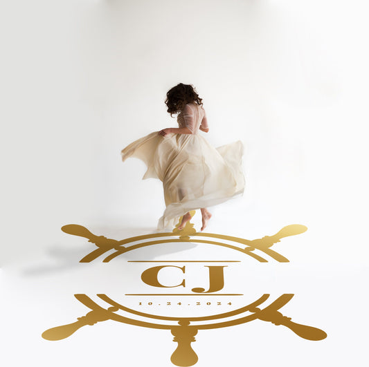 Ship Wheel Monogram Dance Floor Decal for Wedding in gold on a white wedding dance floor