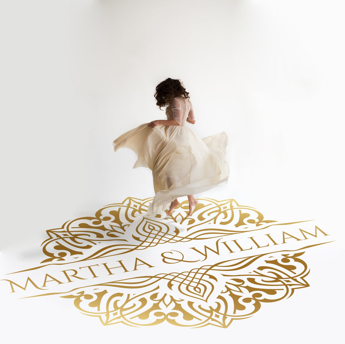 Arabesque Medallion Dance Floor Decal for Wedding in gold on a white wedding dance floor