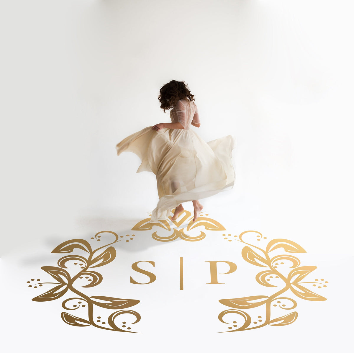 Classic Crest Wreath Dance Floor Decal for Wedding in gold on a white wedding dance floor