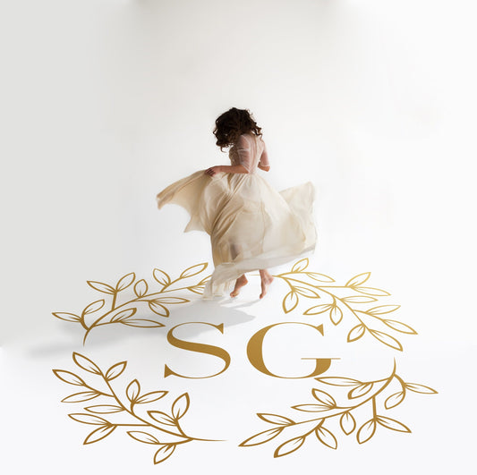 Corner Leaf Monogram Dance Floor Decal for Wedding in gold on a white wedding dance floor