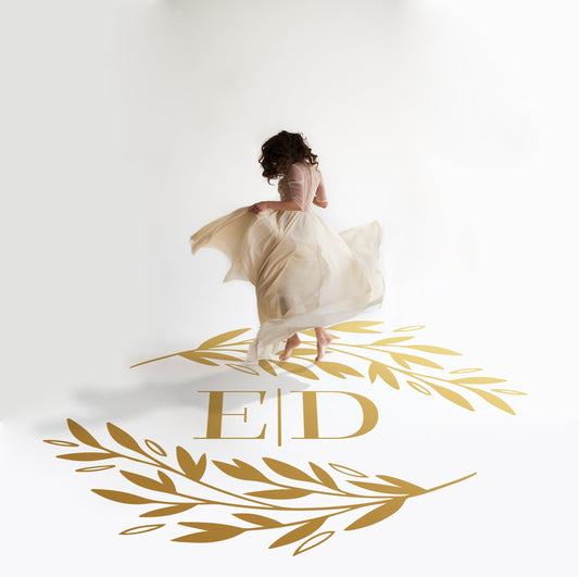 Olive Branch Monogram Dance Floor Decal for Wedding in gold on a white wedding dance floor
