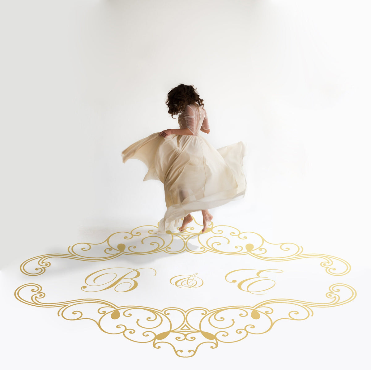 Ironwork Frame Monogram Dance Floor Decal for Wedding in gold on a white wedding dance floor
