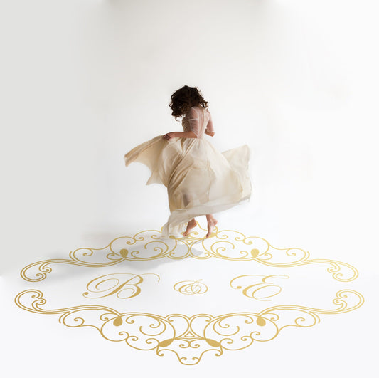Ironwork Frame Monogram Dance Floor Decal for Wedding in gold on a white wedding dance floor