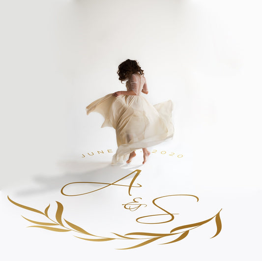 Calligraphy Script Dance Floor Decal for Wedding in gold on a white wedding dance floor