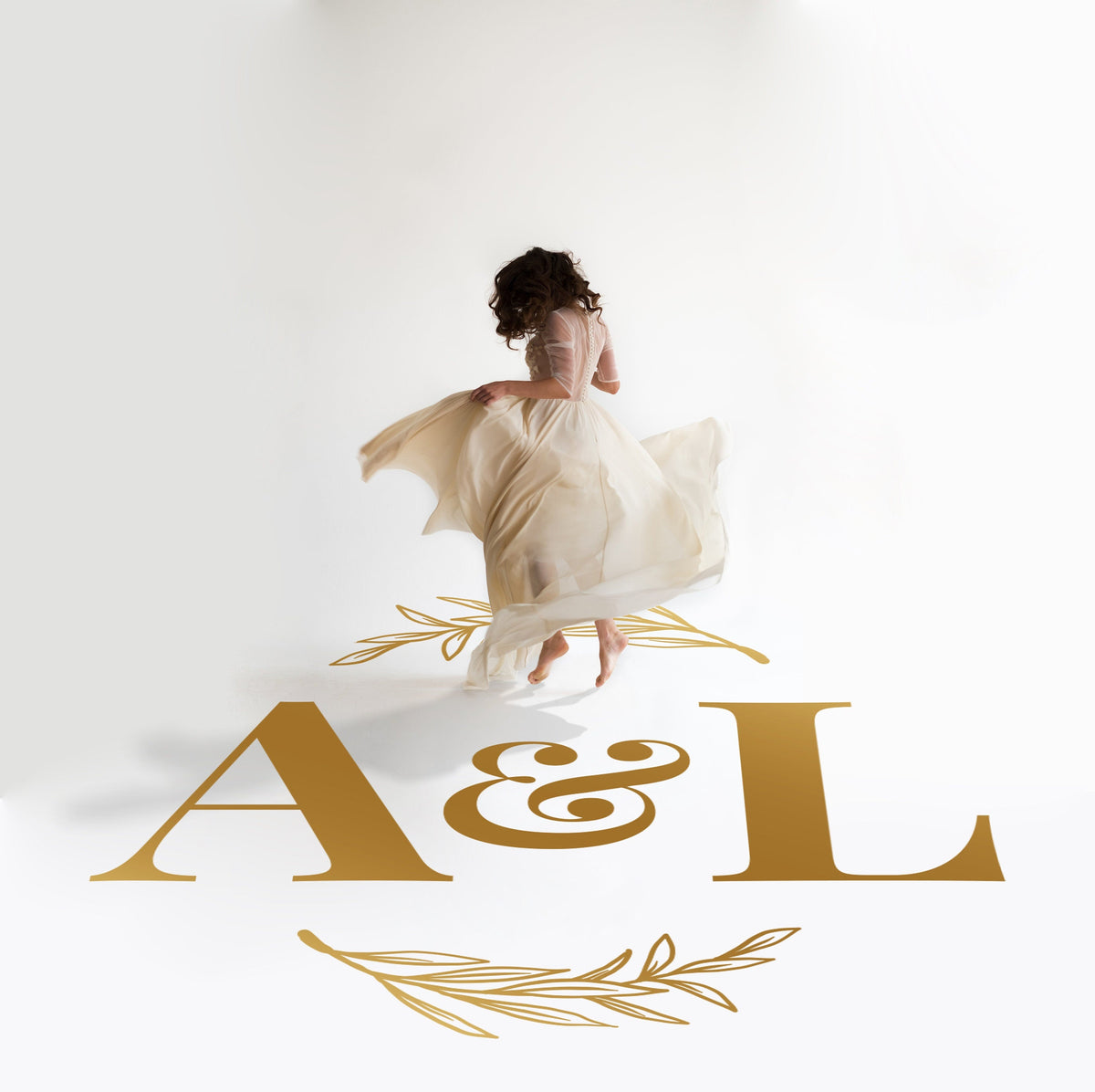 Bold Ampersand Initials Dance Floor Decal for Wedding in gold on a white wedding dance floor