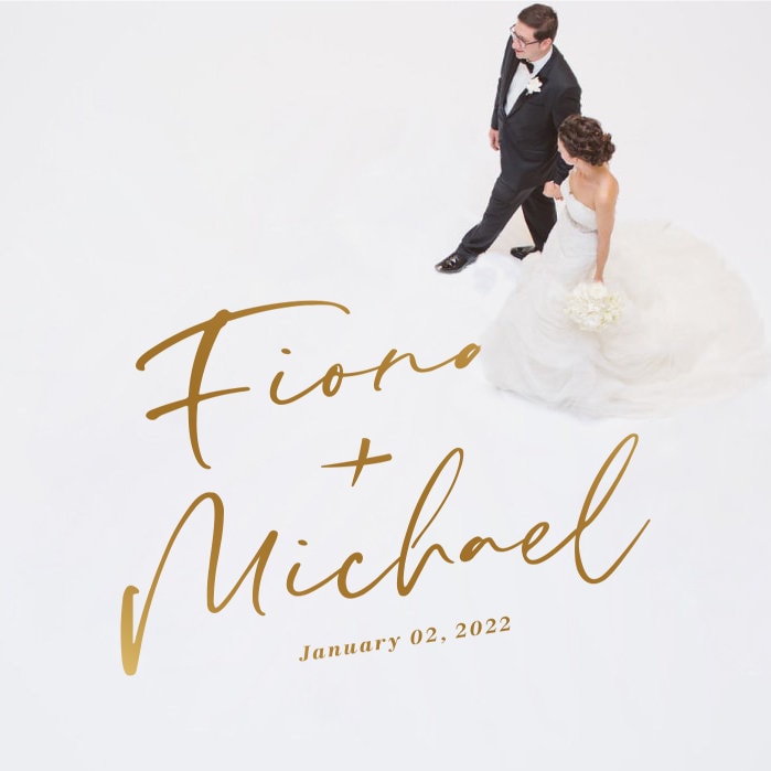 Italic Signature Names Dance Floor Decal for Wedding shown at a wedding reception