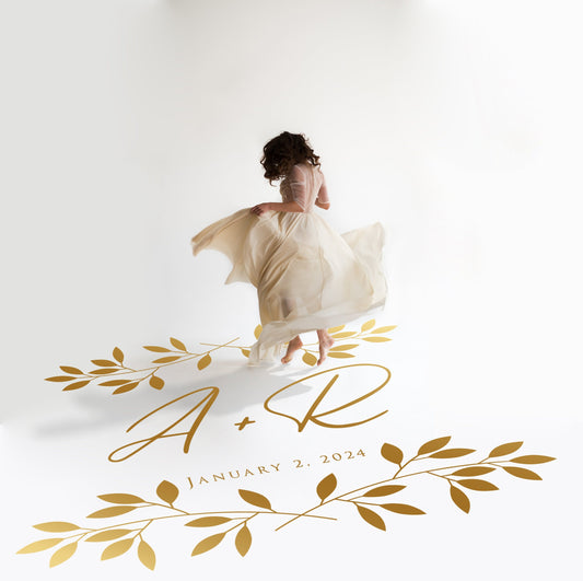 Crossed Leaf Spray Dance Floor Decal for Wedding in gold on a white wedding dance floor