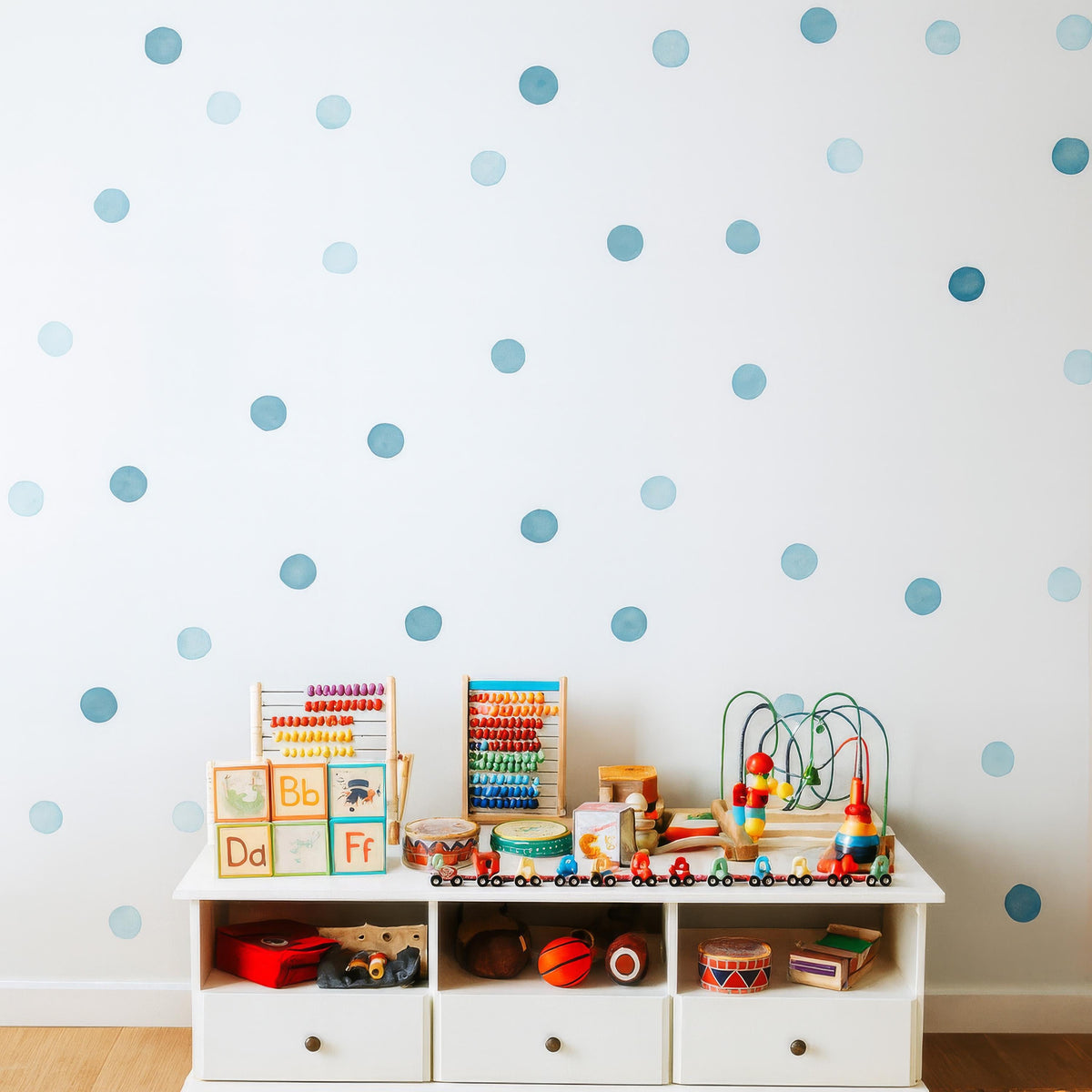 Blue Watercolor Polka Dot Wall Decals installed on a styled nursery wall