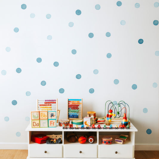 Blue Watercolor Polka Dot Wall Decals installed on a styled nursery wall