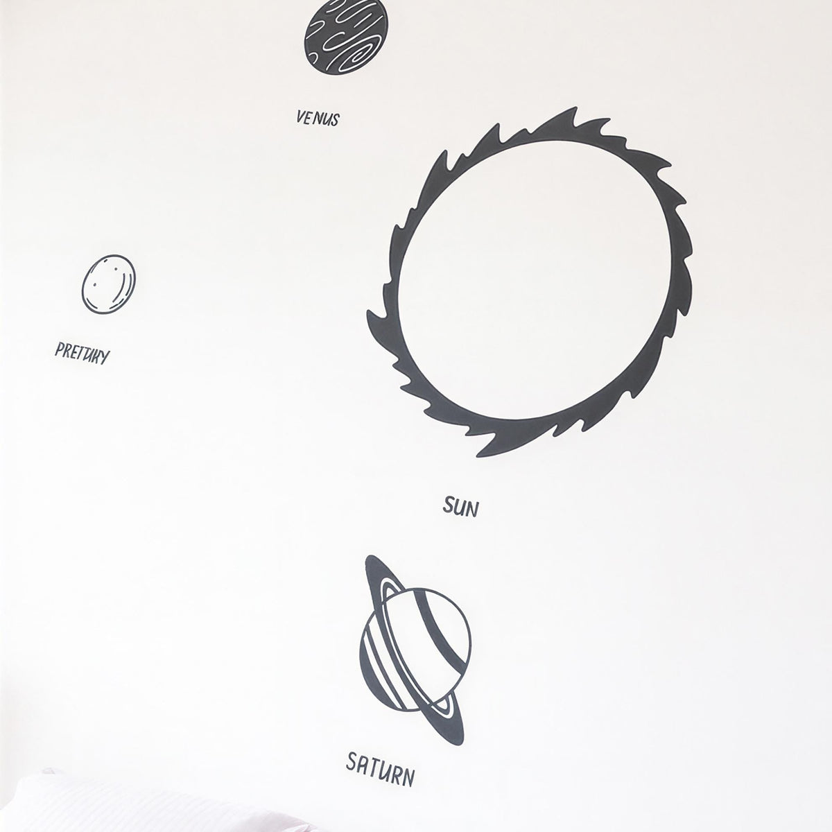 Solar System Wall Decal Set (Sun + Planets + Labels) styled in a room setting