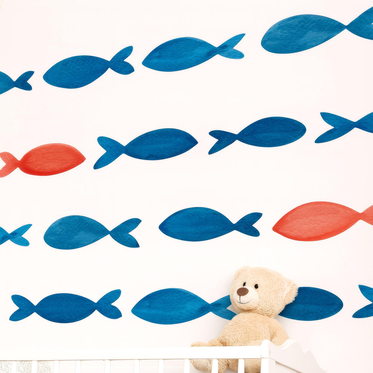 Watercolor Fish Wall Decals arranged on a feature wall