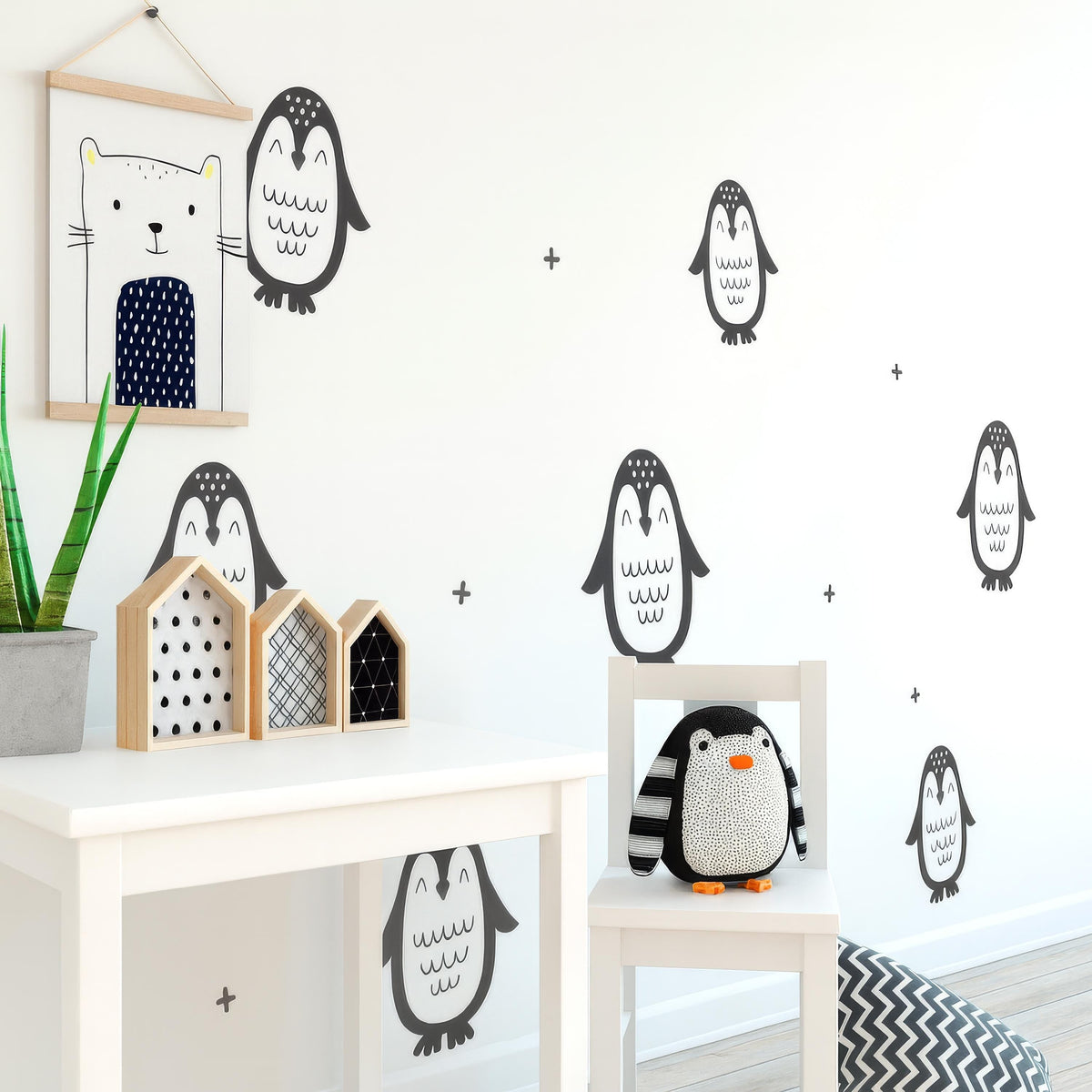 Penguin Wall Decals Set (12 Large Penguins 9-12") arranged on a feature wall