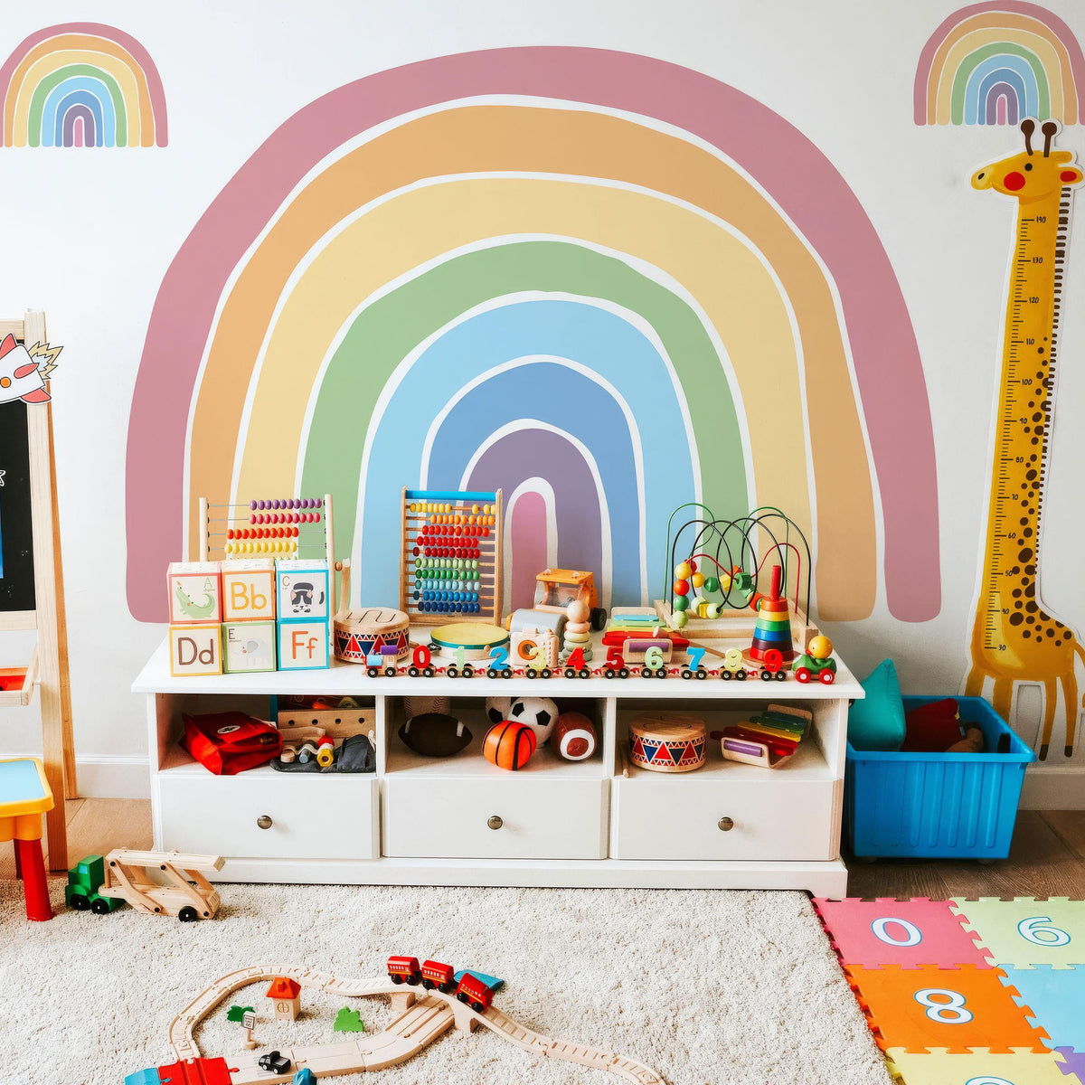 Large Rainbow Wall Decal arranged on a feature wall