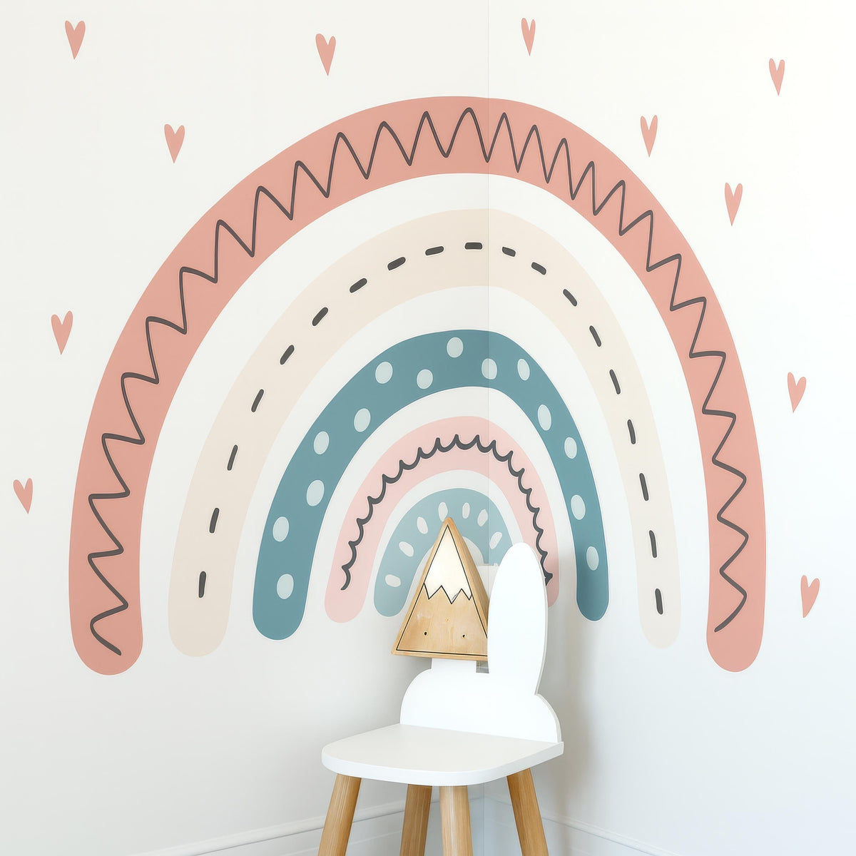 Rainbow Wall Decal with Hearts styled in a room setting