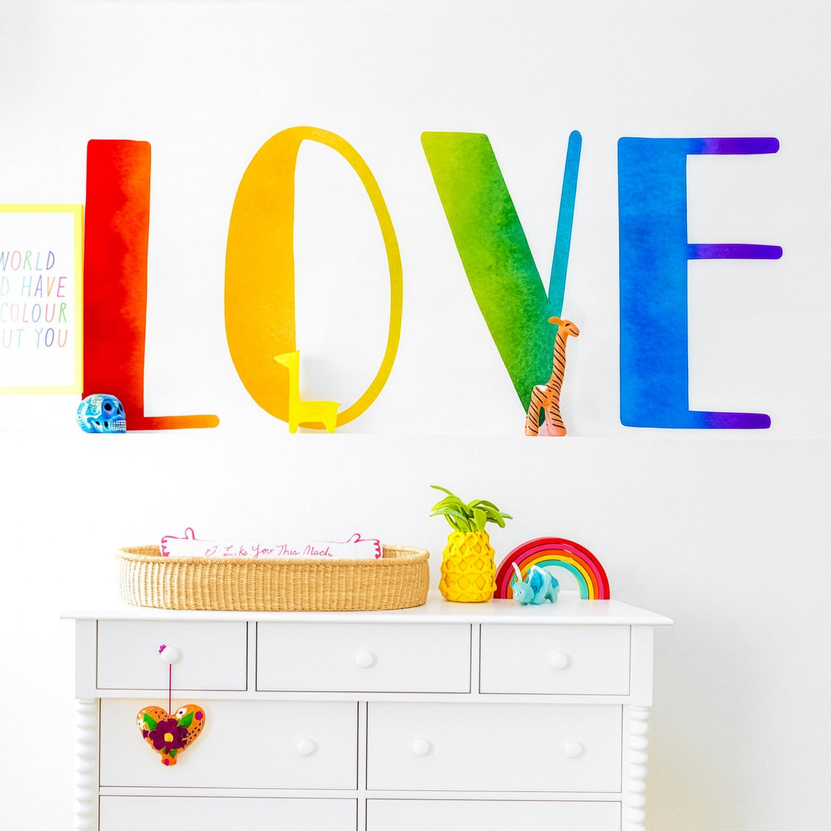 Rainbow LOVE Wall Decal shown in a home interior