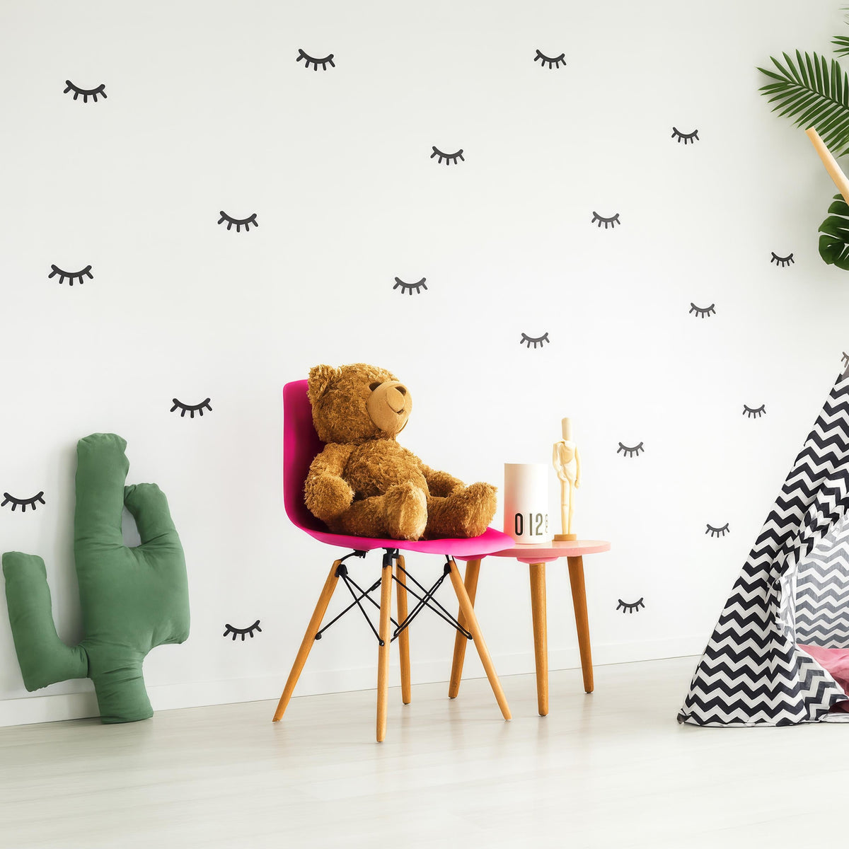 Eyelash Wall Decals Set (70 or 140) installed on a styled nursery wall