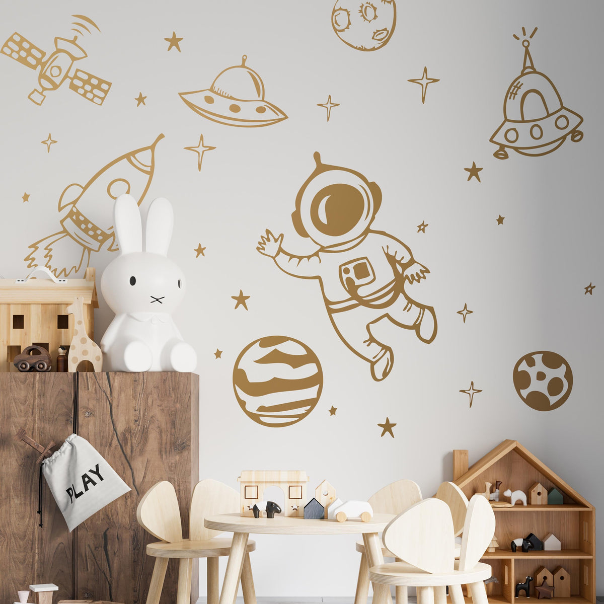 Astronaut Space Wall Decals Set arranged on a feature wall
