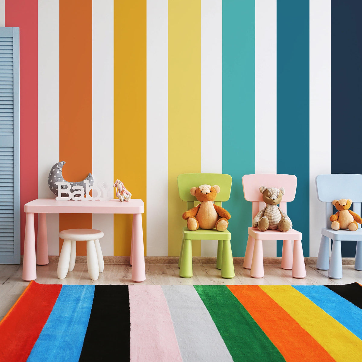 Rainbow Stripe Wall Decals arranged on a feature wall