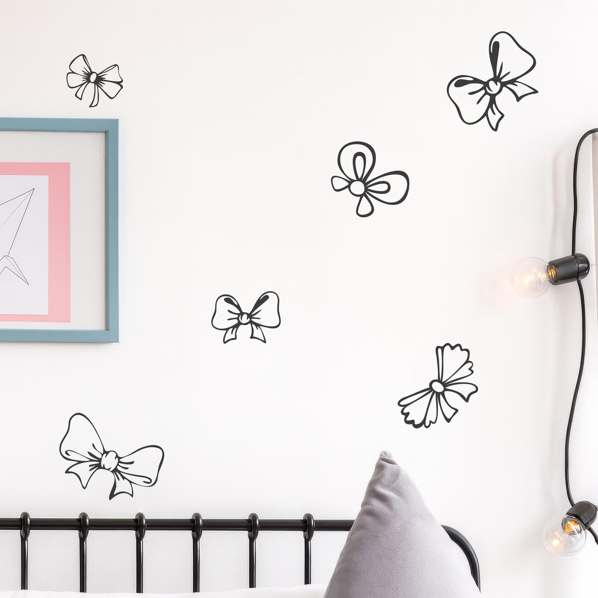 Bow Wall Decals Set (22 or 44) arranged on a feature wall