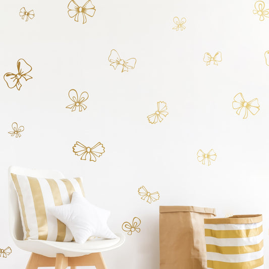 Bow Wall Decals Set (22 or 44) installed on a styled nursery wall