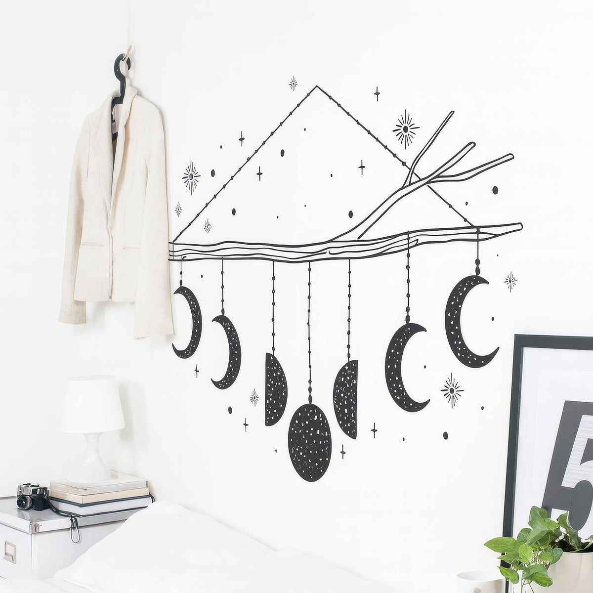 Moon Phase Mobile Wall Decal shown in a home interior