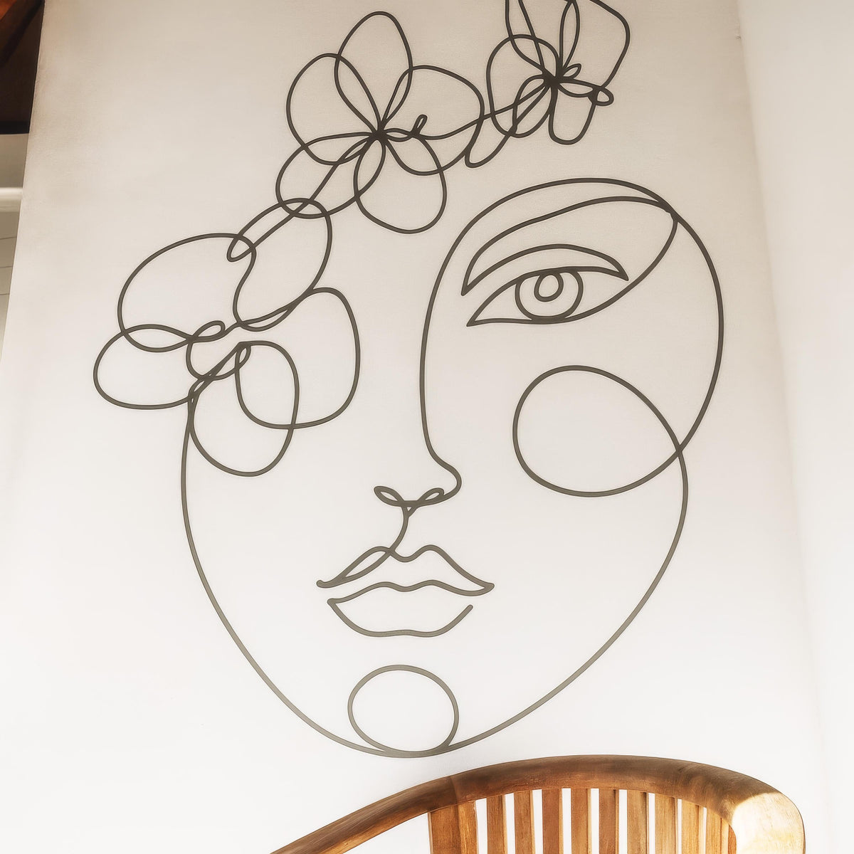 Boho Line Art Face Wall Decal shown in a home interior