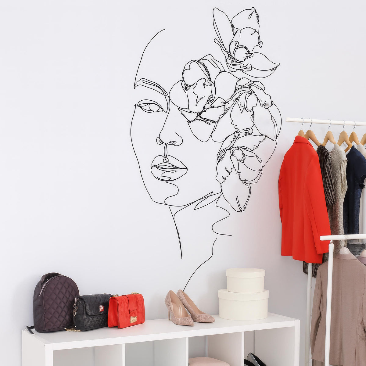 Minimalist Floral Face Wall Decal displayed in a styled space