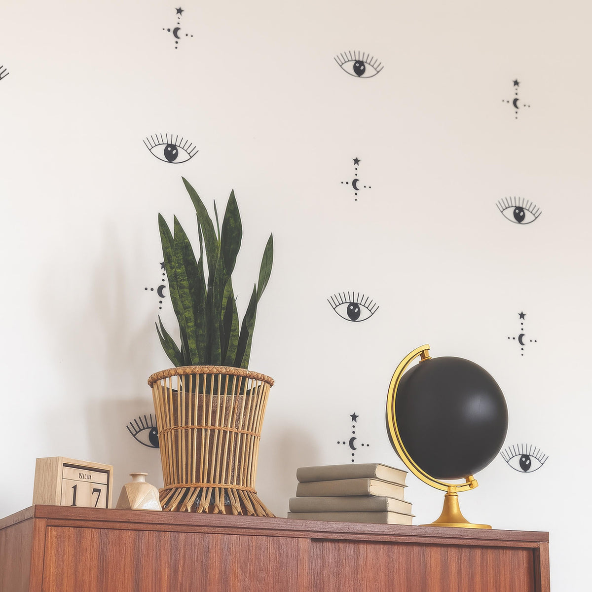 Boho Evil Eye Wall Decals arranged on a feature wall