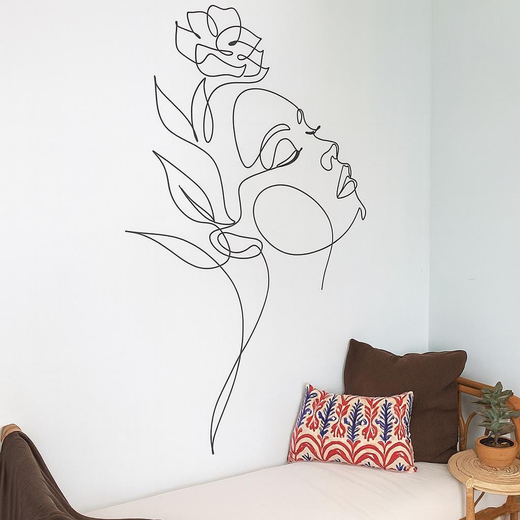 Woman Face Wall Decal styled in a room setting