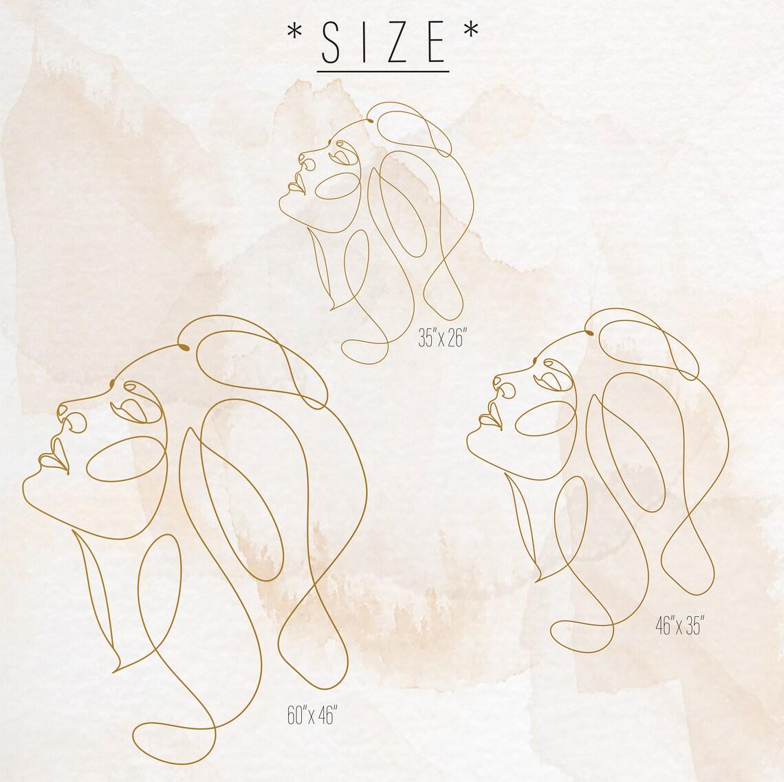 Woman Face Wall Decal size reference on a wall