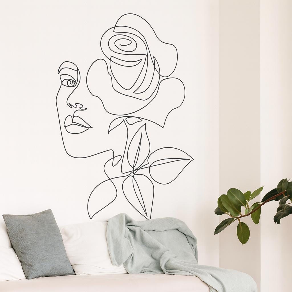 Floral Head Wall Decal displayed in a styled space