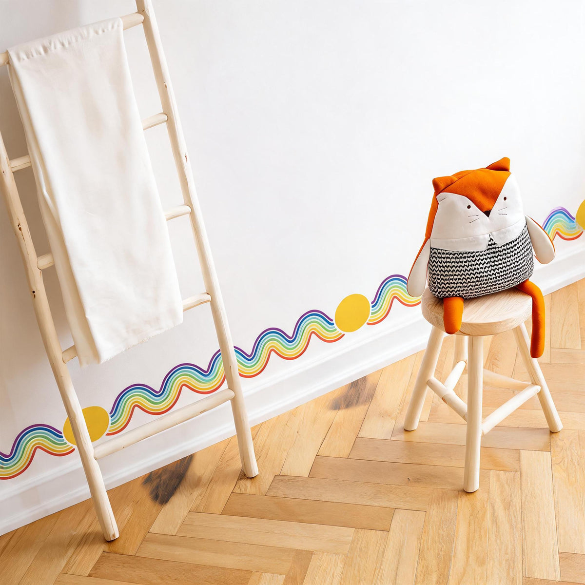 Rainbow Wall Decal Border shown in a home interior