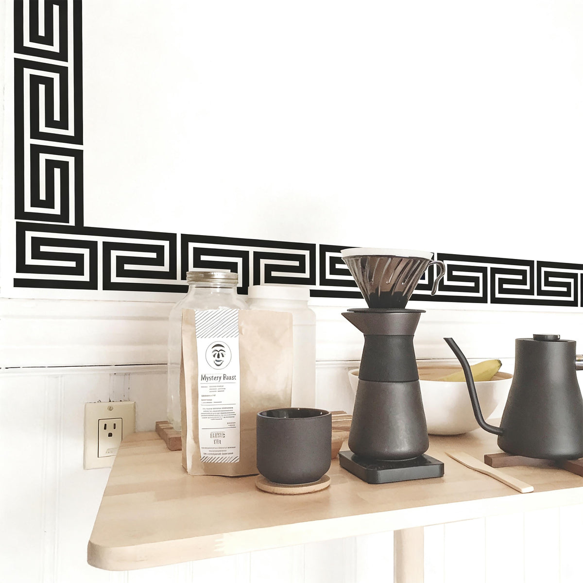 Greek Key Wall Decal Border installed on a styled wall