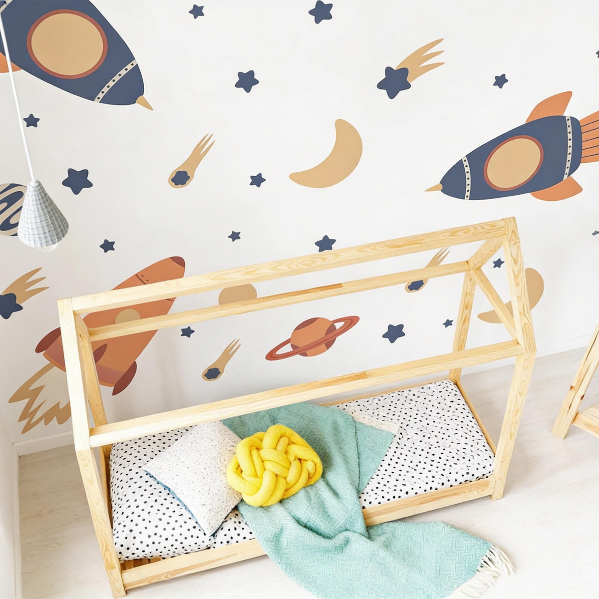 Space Wall Decals arranged on a feature wall
