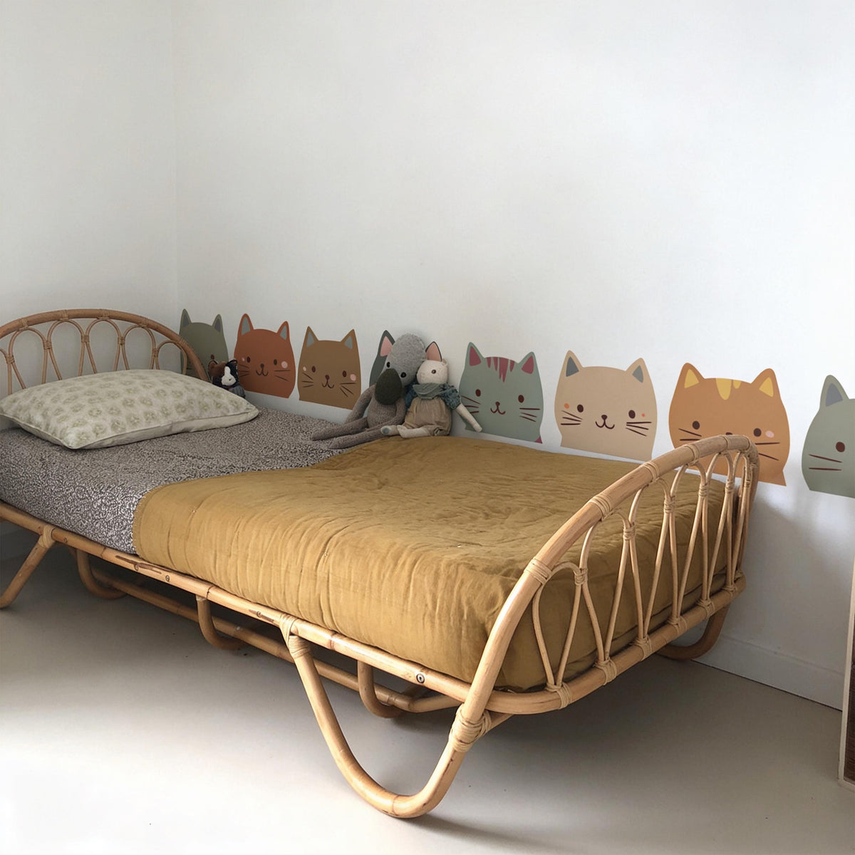 Cat Border Wall Decal arranged on a wall