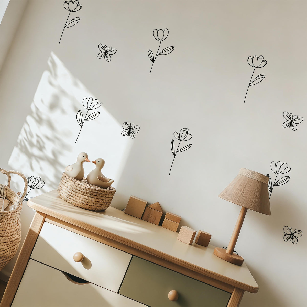 Hanging Flower Wall Decals with Butterflies displayed in a styled space