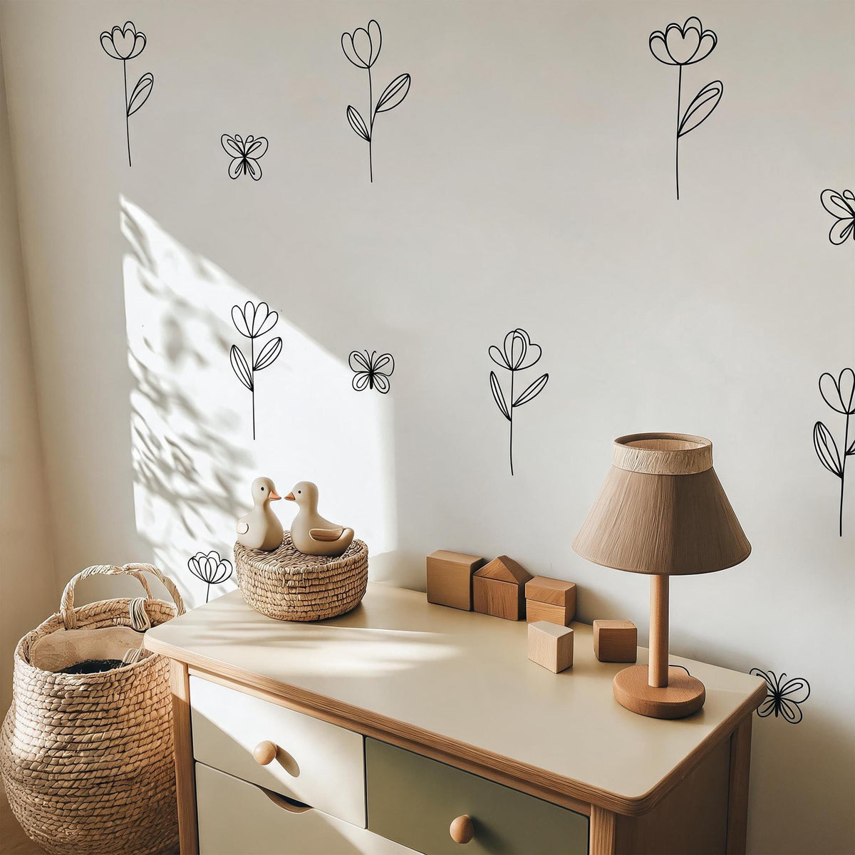 Hanging Flower Wall Decals with Butterflies arranged on a wall