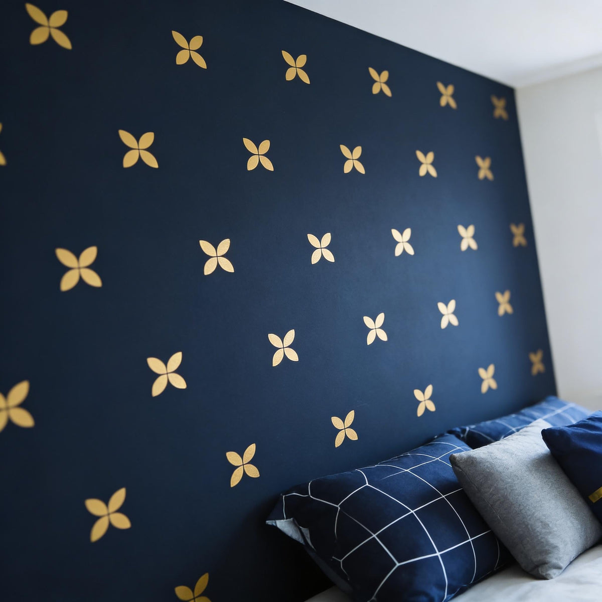 Minimalist Flower Wall Decals displayed in a styled space